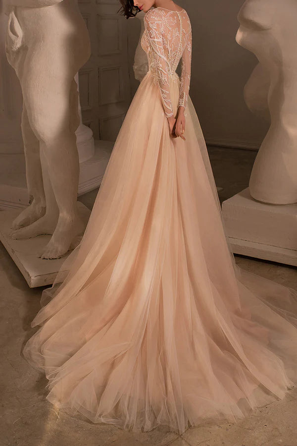 A-line illusion neckline lace embroidery long sleeved bohemian style wedding dress