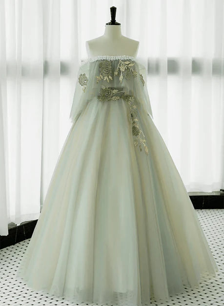 Robe de bal longue élégante en dentelle, vert clair, épaules dénudées, transparente, coupe trapèze, en dentelle strass verte, sans manches, dos nu