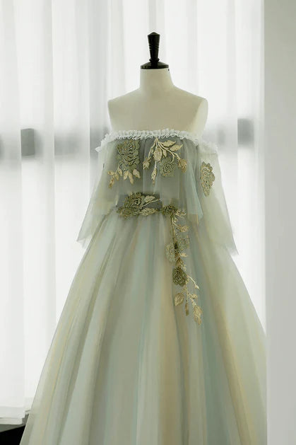 Robe de bal longue élégante en dentelle, vert clair, épaules dénudées, transparente, coupe trapèze, en dentelle strass verte, sans manches, dos nu
