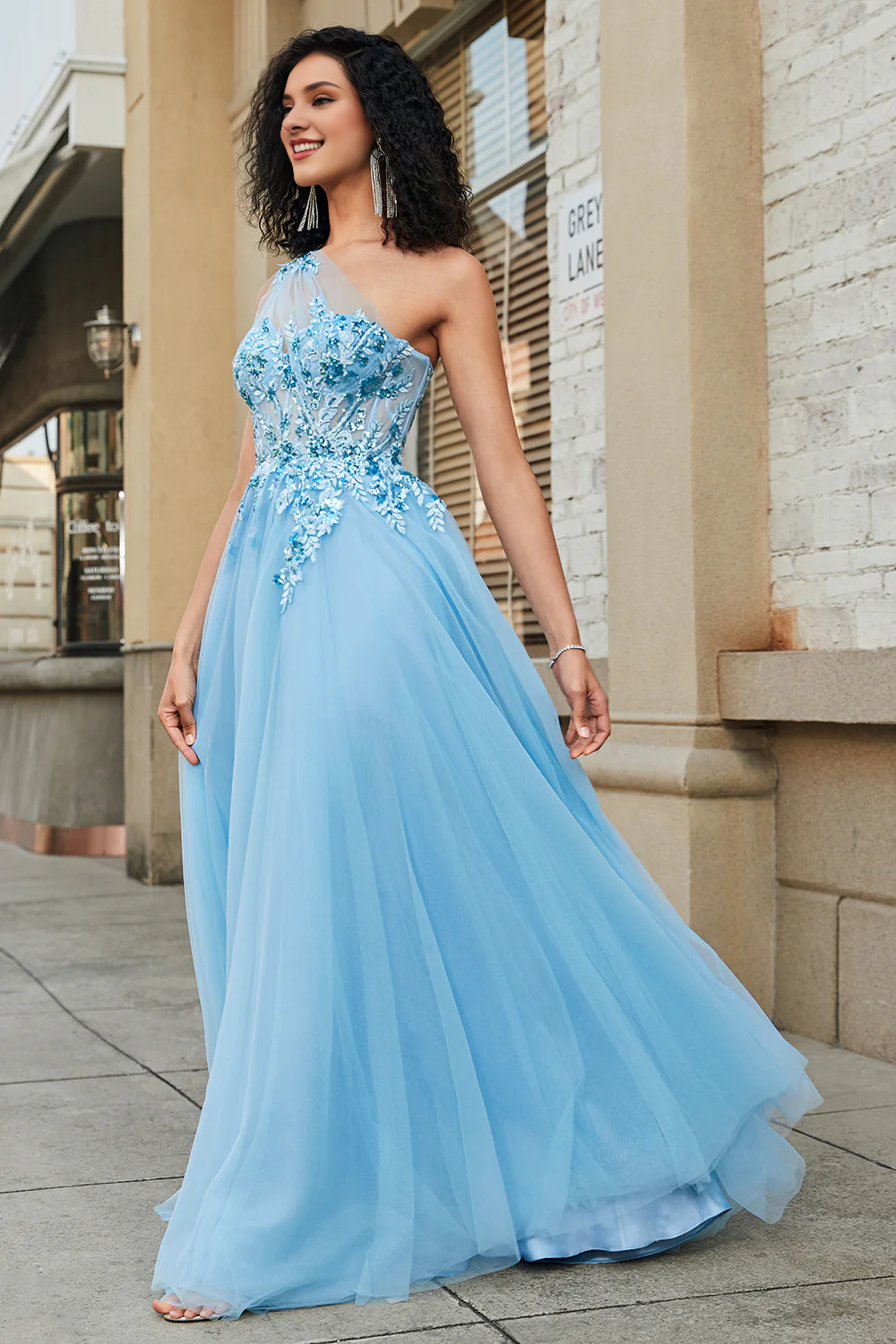 A-line one shoulder sequin light blue decal long ball gown