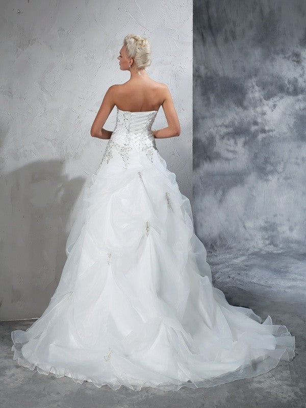 Robe de mariée longue en organza, sans bretelles, avec perles et sans manches