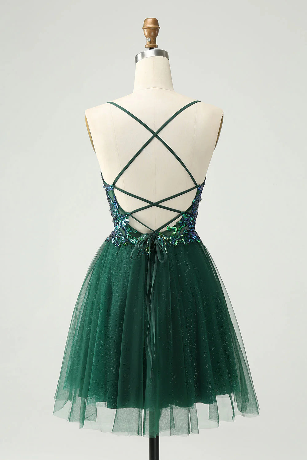 Jolie robe courte vert foncé à paillettes et col en V pour la rentrée scolaire