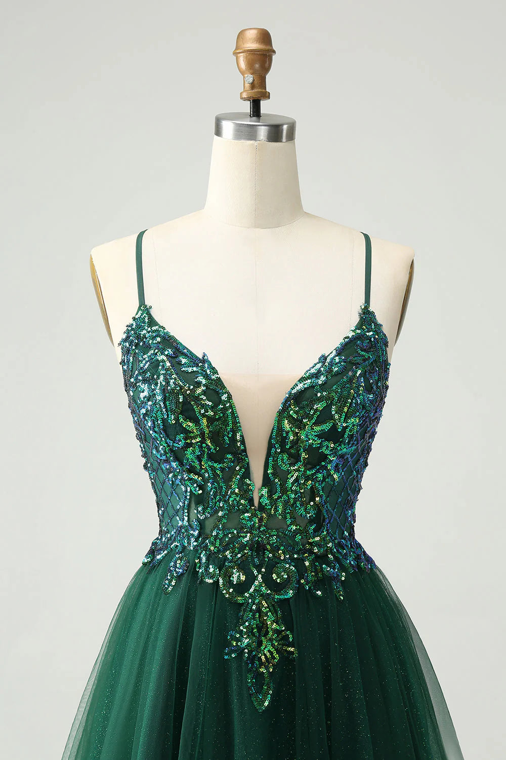 Jolie robe courte vert foncé à paillettes et col en V pour la rentrée scolaire