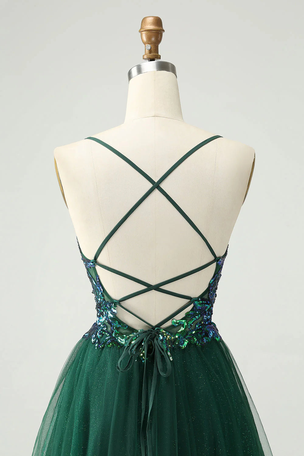 Jolie robe courte vert foncé à paillettes et col en V pour la rentrée scolaire