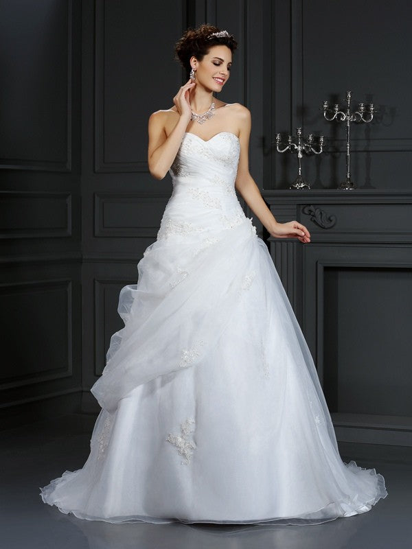 Robe de mariée longue en organza, sans manches, décolleté en cœur, perles