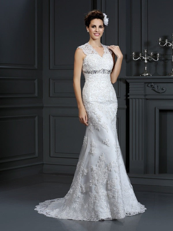 Robe de mariée longue en dentelle, sans manches, col en V, avec perles