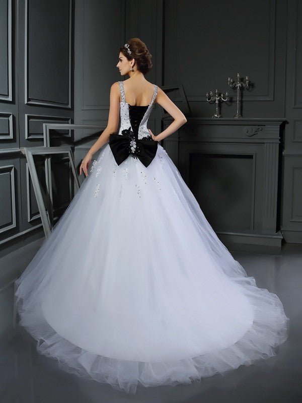 Robe de mariée longue en tulle, sans manches, avec bretelles et perles
