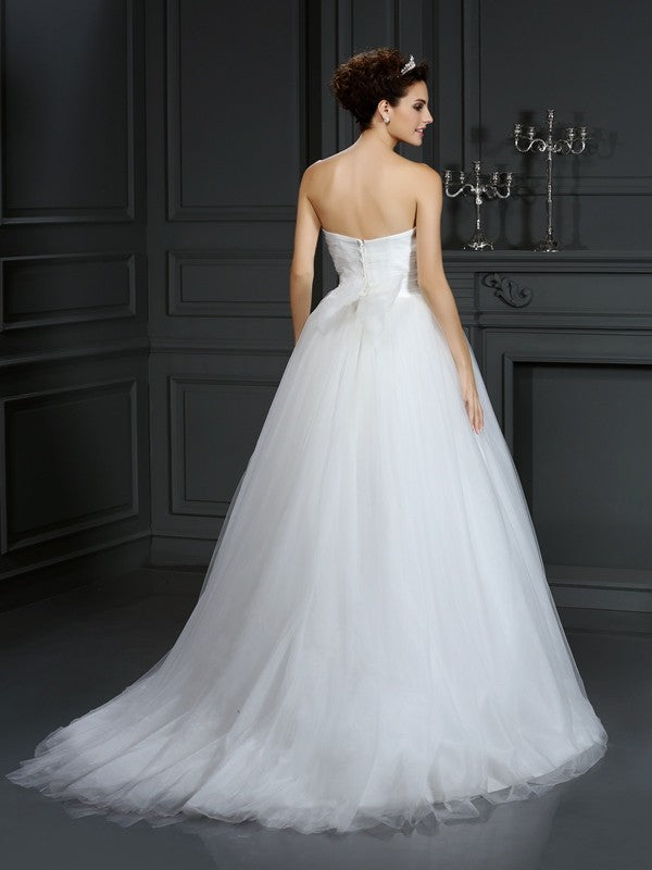 Robe de mariée longue en tulle, sans manches, décolleté en cœur, perles