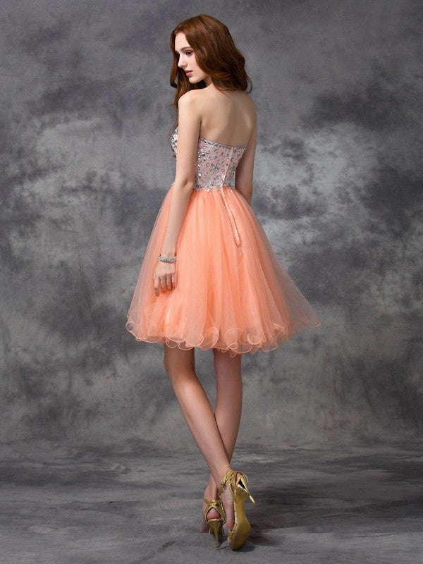 Robe de cocktail courte en tulle, coupe trapèze/princesse, bretelles spaghetti, perles, sans manches