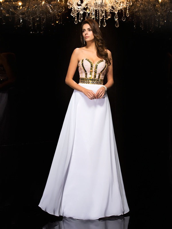 Robe longue en mousseline de soie, coupe trapèze/princesse, décolleté en cœur, sans manches, à sequins