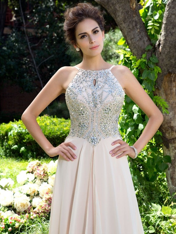 Robe longue en mousseline de soie, coupe trapèze/princesse, bretelles spaghetti, perles, sans manches