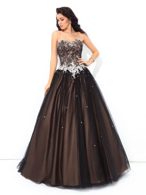 Robe de bal en tulle, décolleté en cœur, perles, sans manches, longue