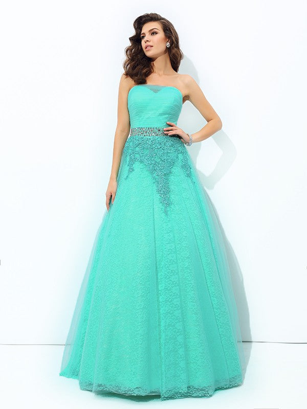 Robe longue en satin tissé, coupe trapèze/princesse, sans bretelles, avec perles, sans manches