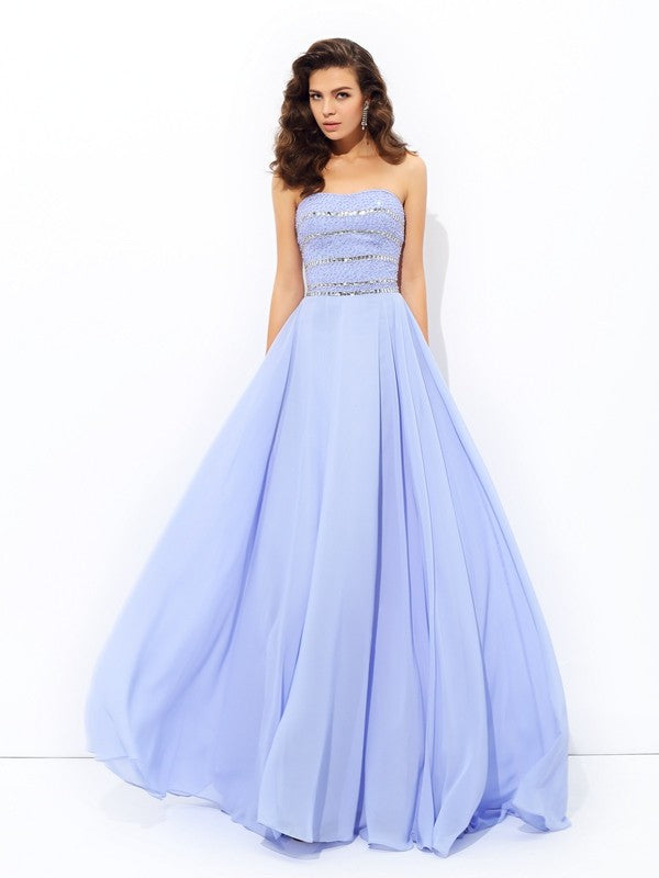 Robe longue en mousseline de soie, coupe trapèze/princesse, sans bretelles, avec perles, sans manches