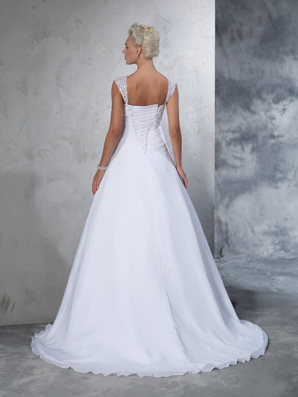 Robe de mariée longue en mousseline de soie, sans manches, avec bretelles et appliques