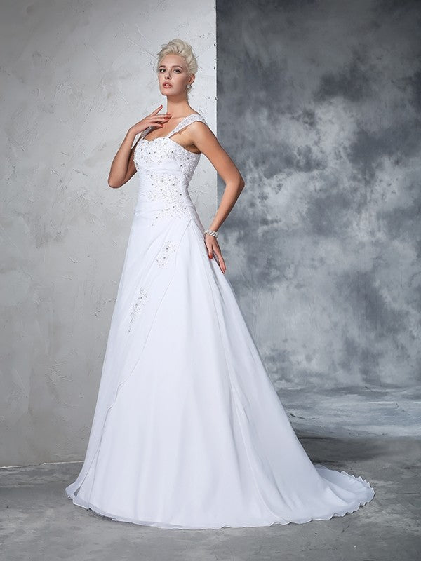 Robe de mariée longue en mousseline de soie, sans manches, avec bretelles et appliques