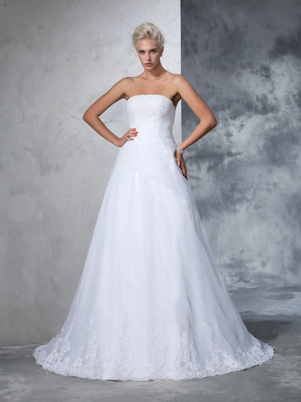 Robe de mariée longue en filet, sans manches, avec appliques et bretelles