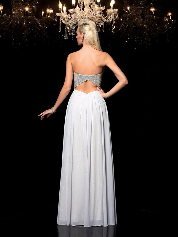 Robe longue en mousseline de soie, coupe trapèze/princesse, décolleté en cœur, sans manches, à sequins