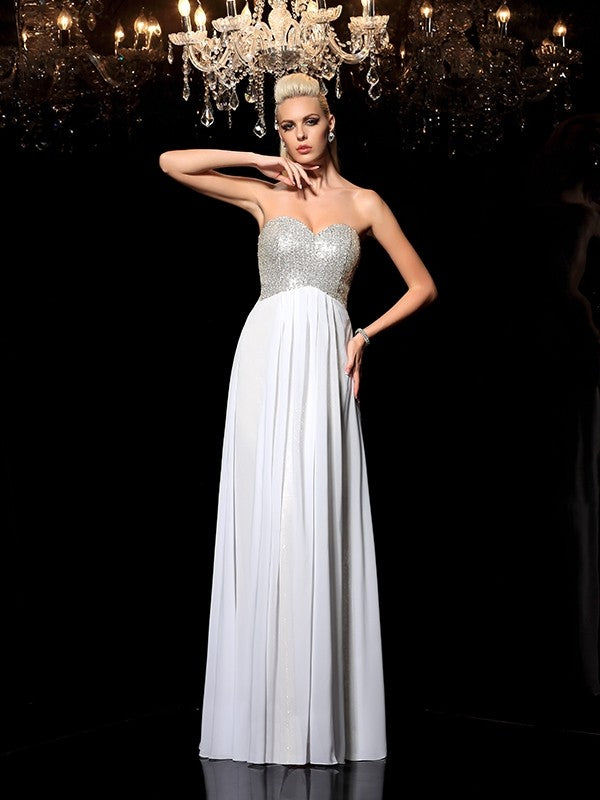 Robe longue en mousseline de soie, coupe trapèze/princesse, décolleté en cœur, sans manches, à sequins