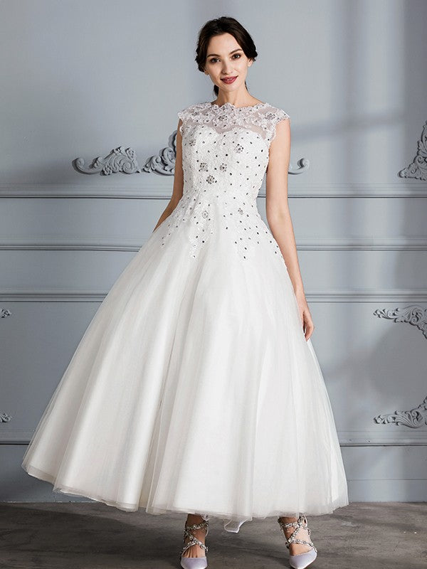 Robe de mariée en tulle, longueur genou, sans manches, décolleté en V profond