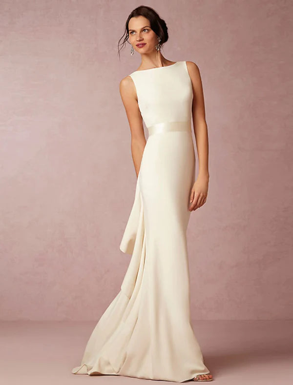Casual open back sheath wedding dress with scoop neck and draping.