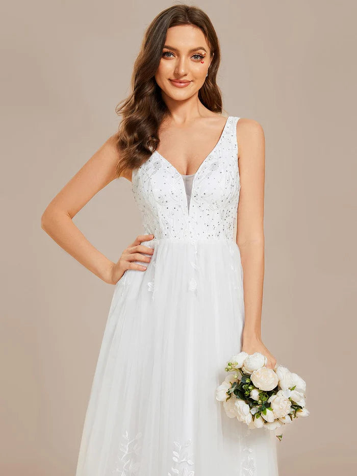 Robe de mariée trapèze sans manches, col en V, en tulle brodé avec appliques