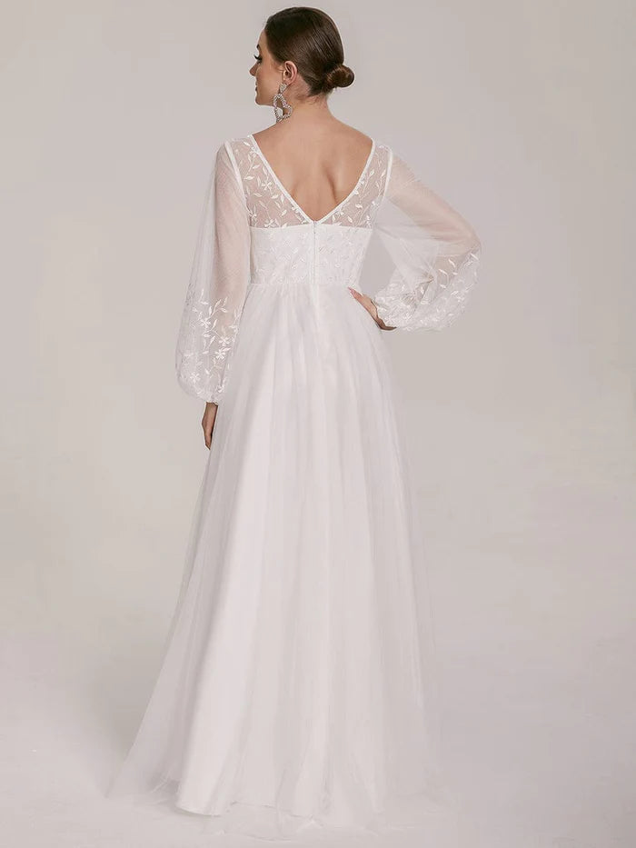 Robe de mariée trapèze à manches bouffantes et à fleurs transparentes 