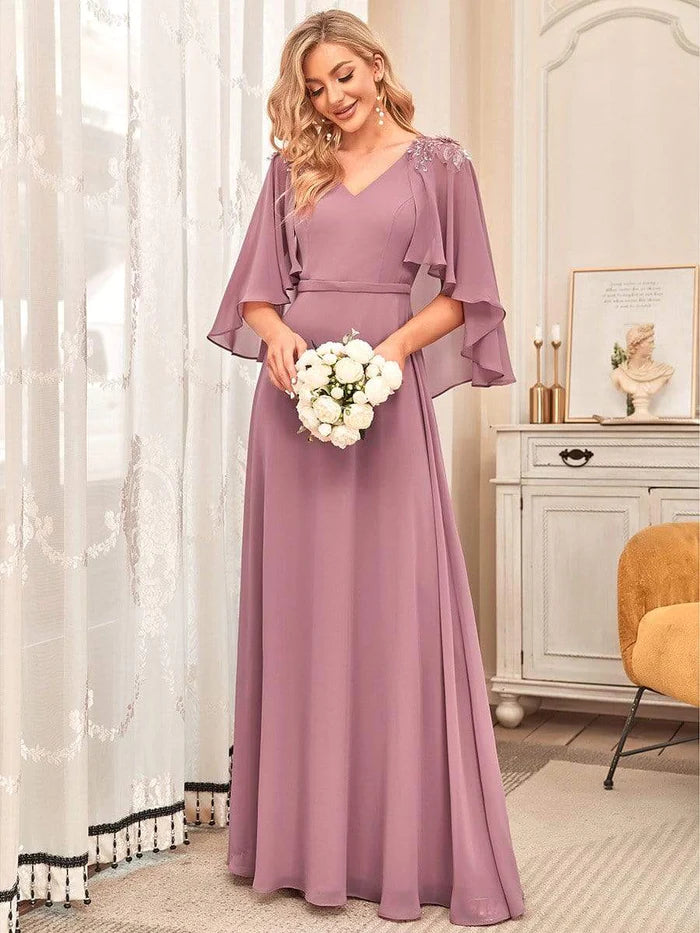 Robes de demoiselle d'honneur élégantes en mousseline fluide à col en V avec volants 