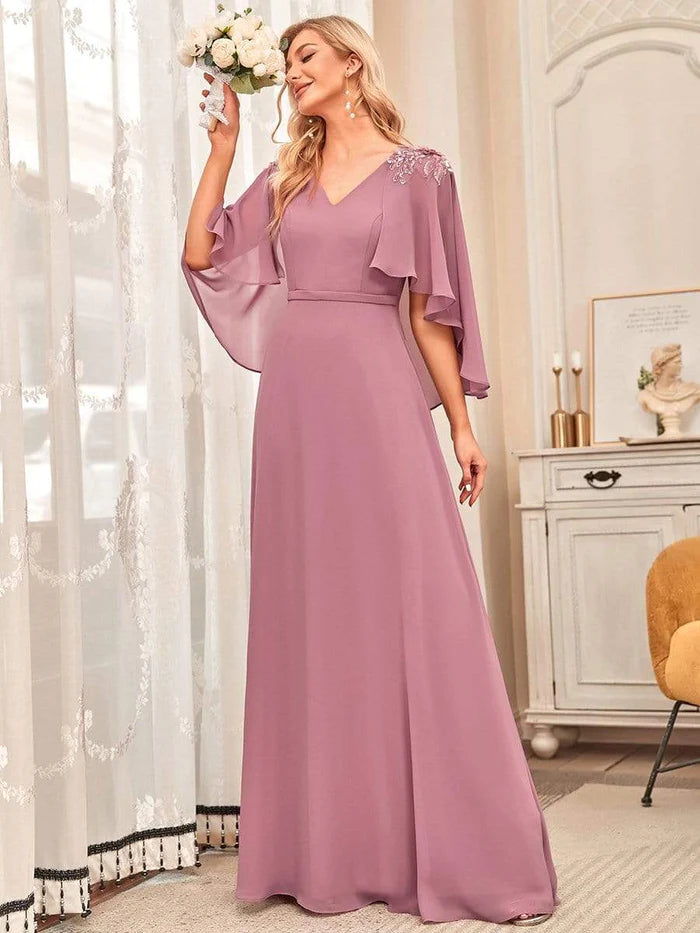 Robes de demoiselle d'honneur élégantes en mousseline fluide à col en V avec volants 