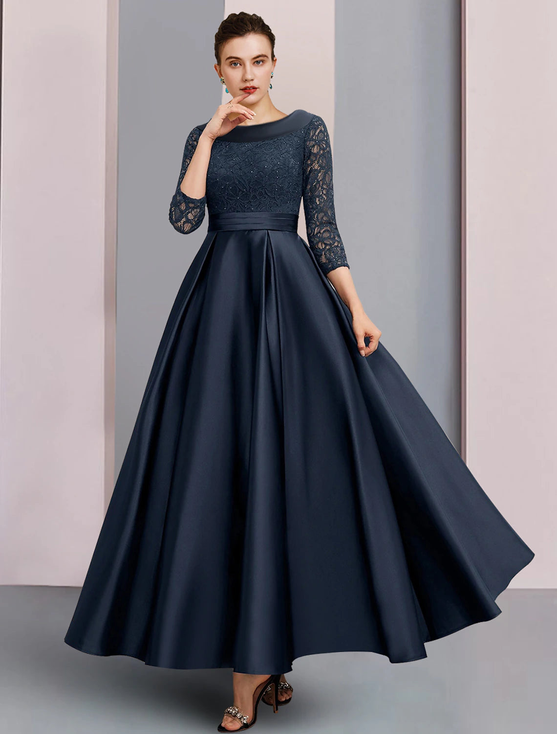 Back view of the A-line dress, highlighting pleated and ruched details.