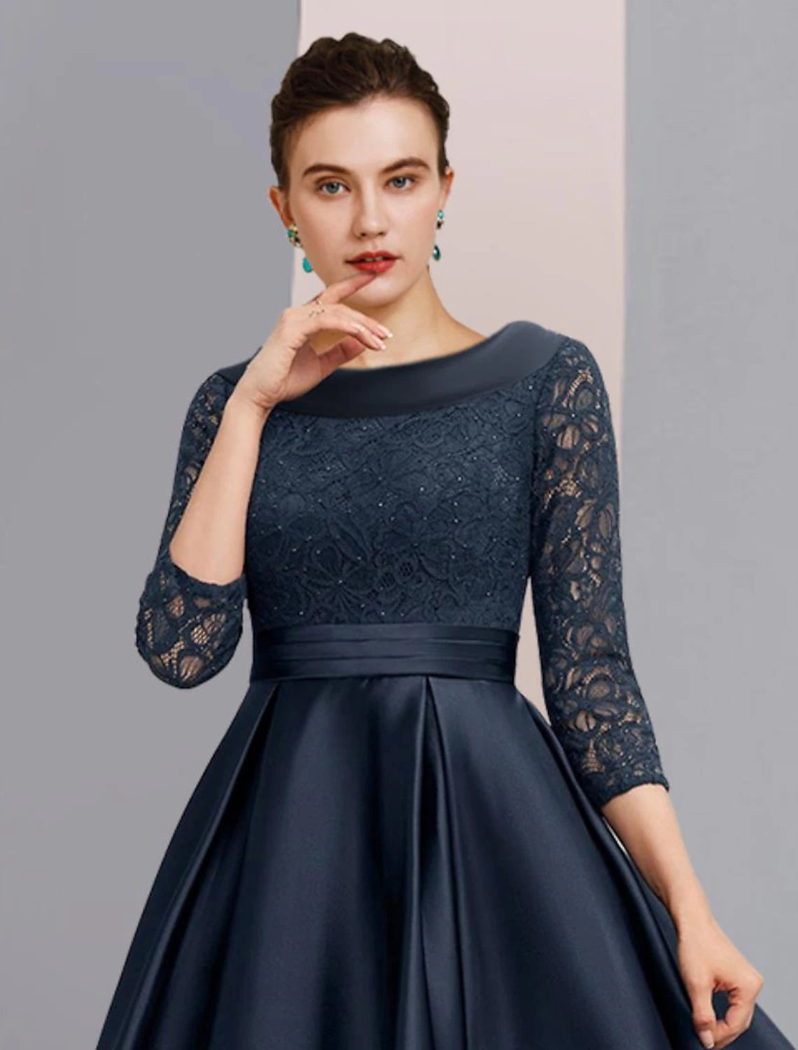 Side profile of the elegant A-line dress, showing the bateau neckline and 3/4 sleeves.