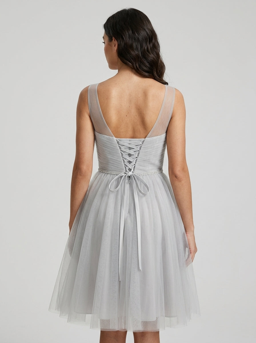 Elegant A-Line Illusion Jewel Neck Lace-Up Tulle Knee-Length Homecoming Dress.