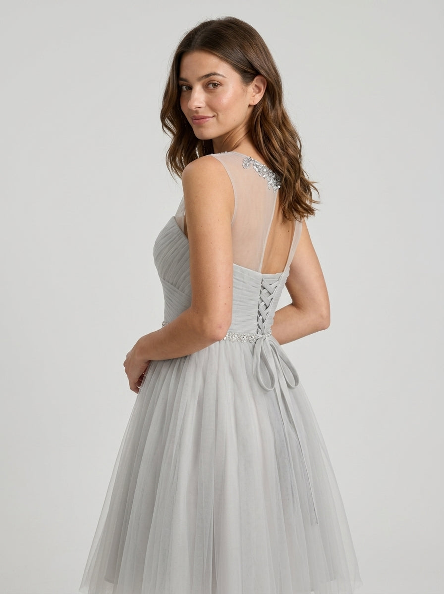 Elegant A-Line Illusion Jewel Neck Lace-Up Tulle Knee-Length Homecoming Dress.