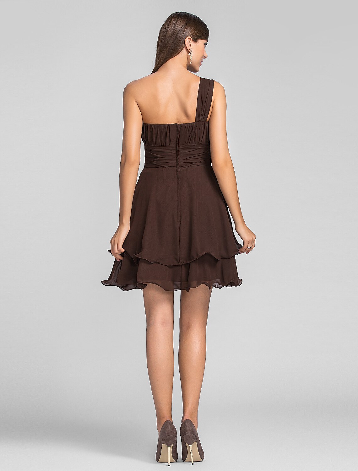 Back view of an elegant A-line one-shoulder short chiffon dress with ruched detailing.