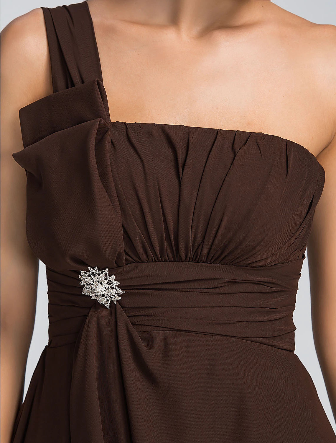 Side view of an elegant A-line one-shoulder short chiffon dress, highlighting the ruched bodice.