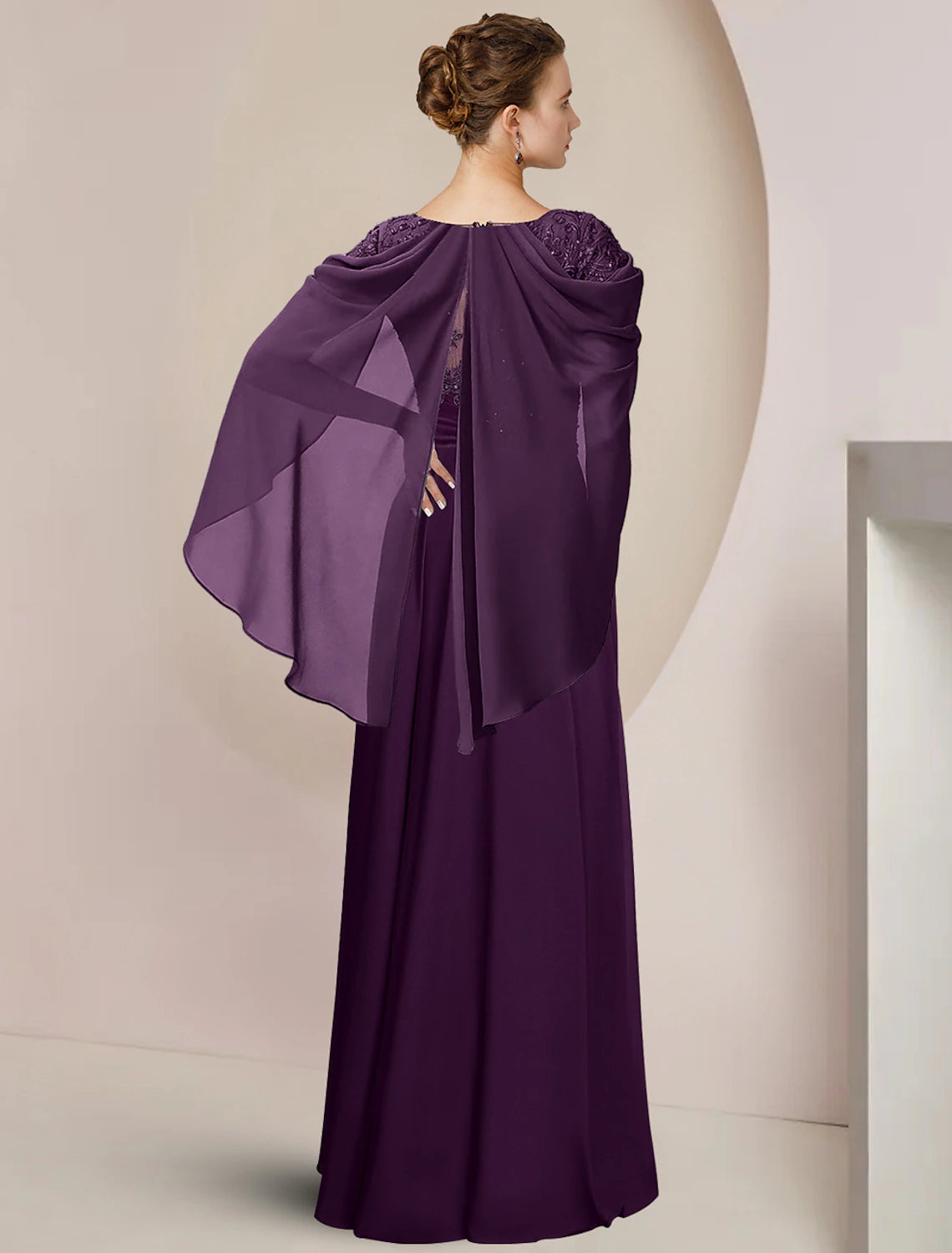 Scoop neck A-Line dress showing elegant silhouette and fabric.