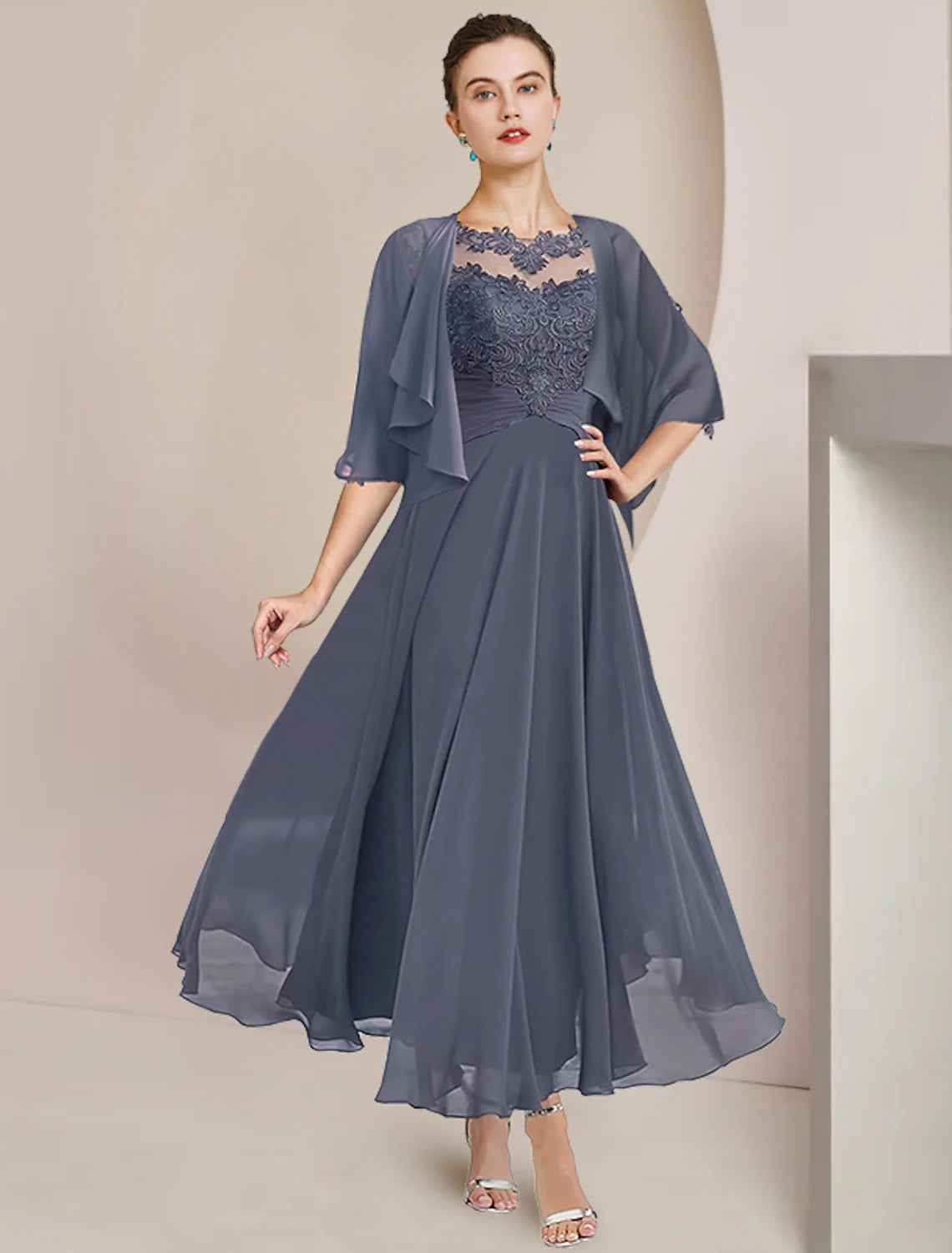 Elegant A-Line Mother of the Bride dress with scoop neck and 3/4 sleeves.