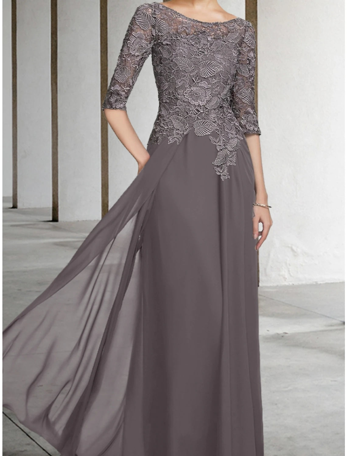 Elegant A-Line dress with half sleeves, lace ruching, and floor length.