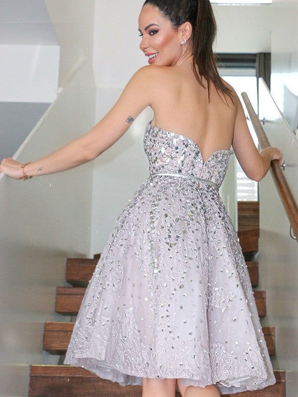 Elegant A-Line Strapless Sequin Tulle Knee-Length Homecoming Party Dress.
