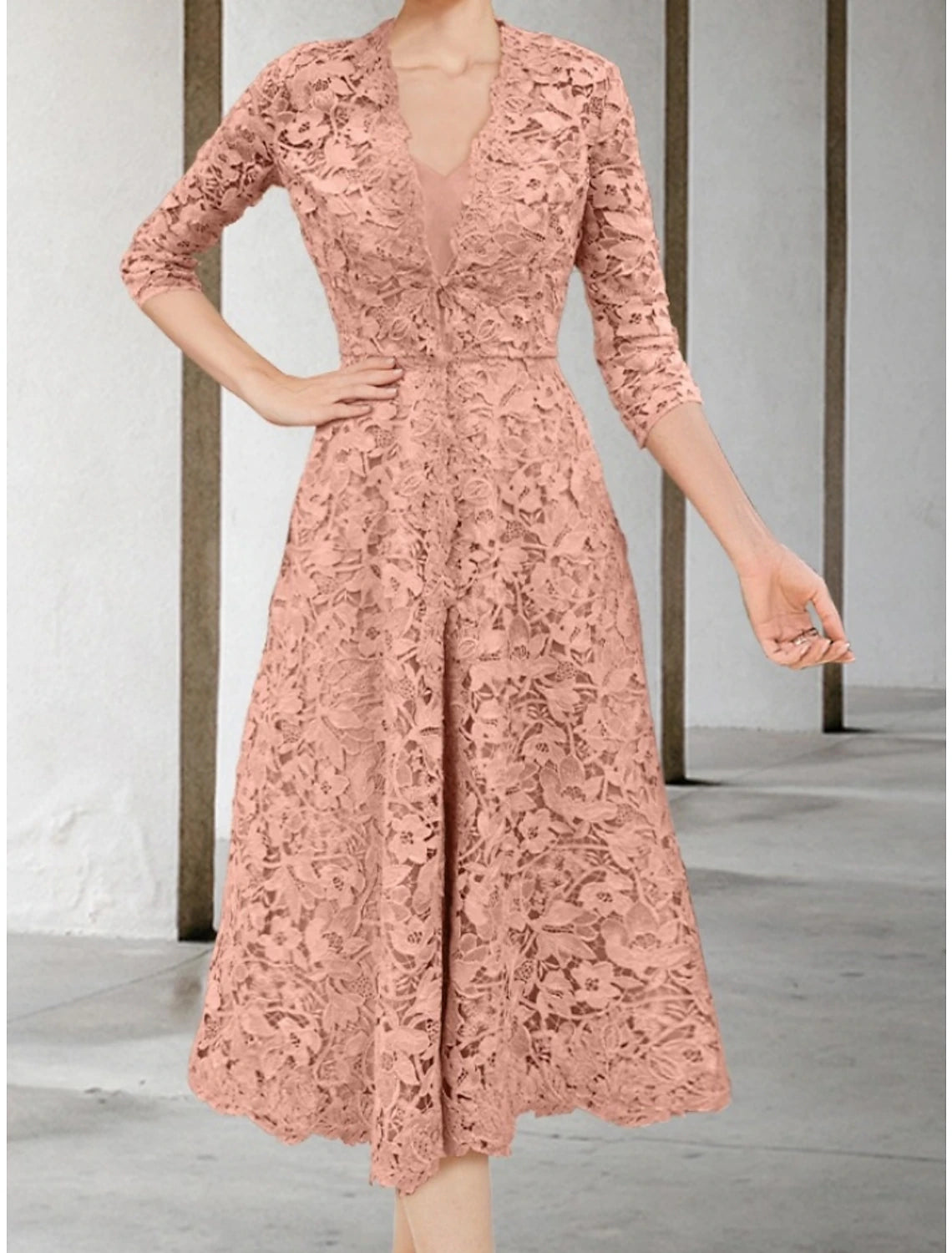 Back view of an A-line V-neck 3/4 sleeve ruched chiffon dress with elegant ruching.
