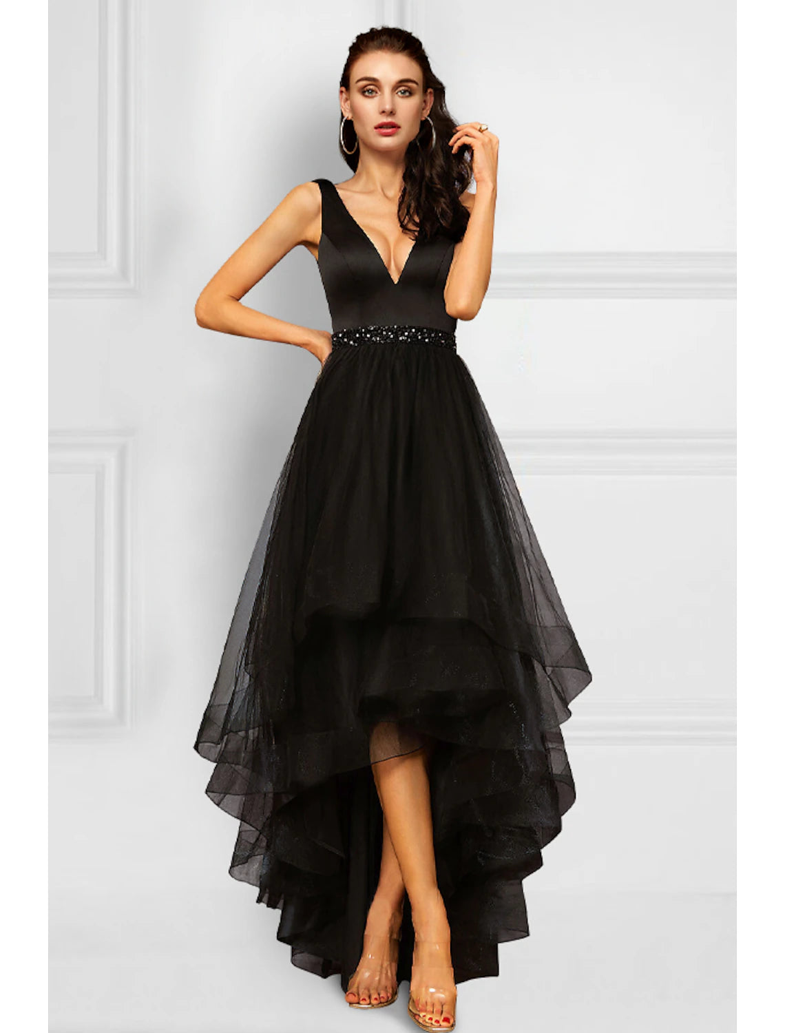 Model wearing an elegant A-line V-neck asymmetrical cocktail dress with ruffles and rhinestones.