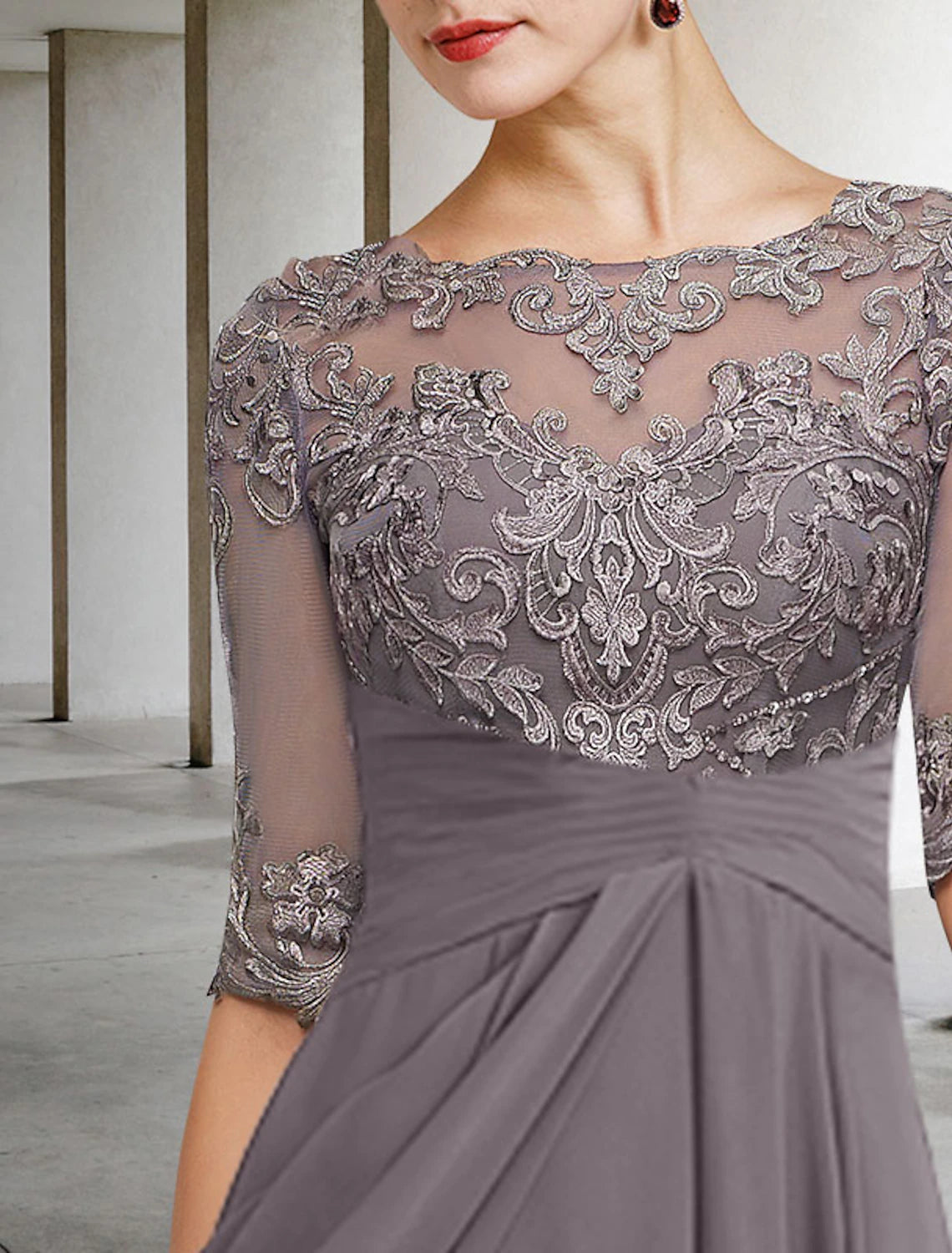Close-up details of the chiffon lace, beading, and appliques on the elegant A-Line dress.