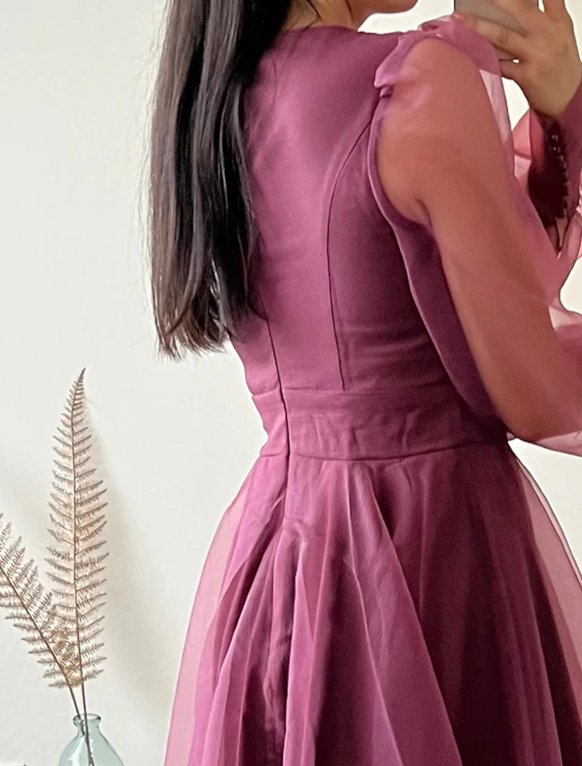 V-neck organza cocktail dress with button details on sleeves.