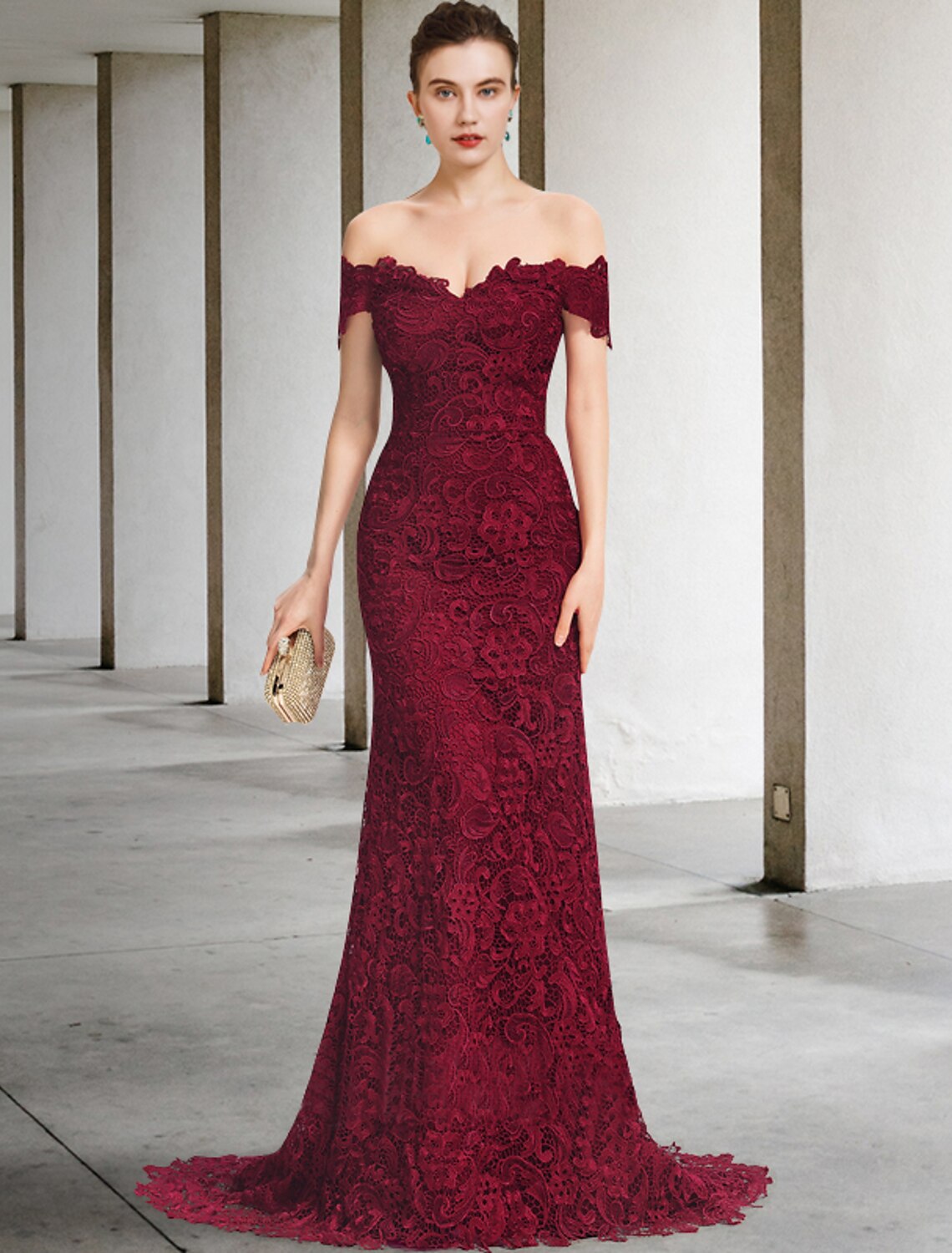 Elegant mermaid trumpet mother of the bride dress with off-shoulder lace and appliques.