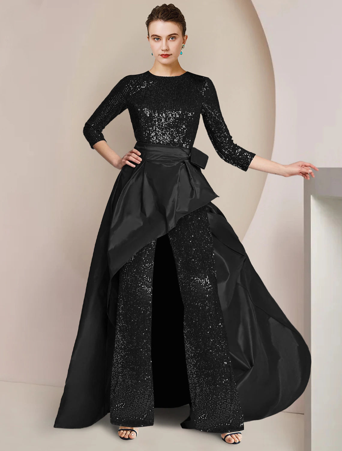 Full view of a formal two-piece jumpsuit with scoop neck and 3/4 sleeves.