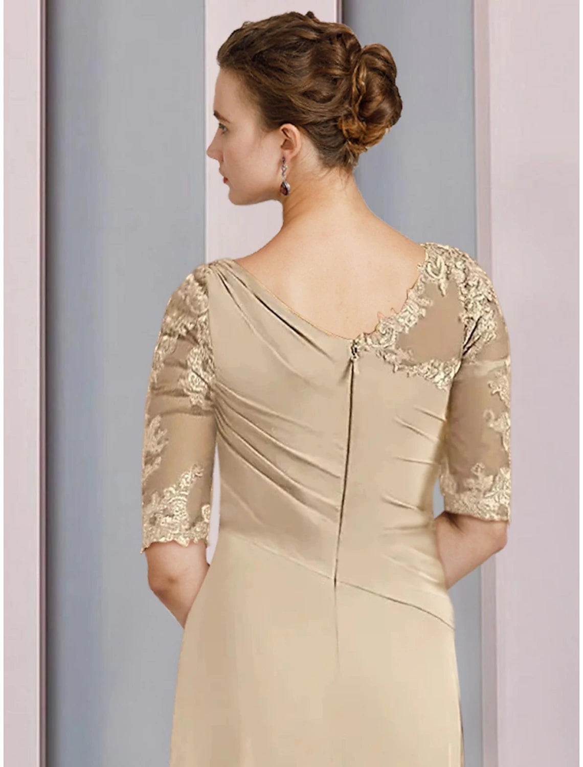 Side view of an elegant chiffon sheath column dress for wedding guests, showing the silhouette.