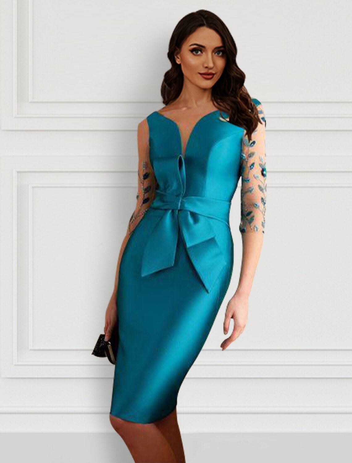 Model wearing an elegant sheath jewel neck half sleeve knee-length party dress with an open back.