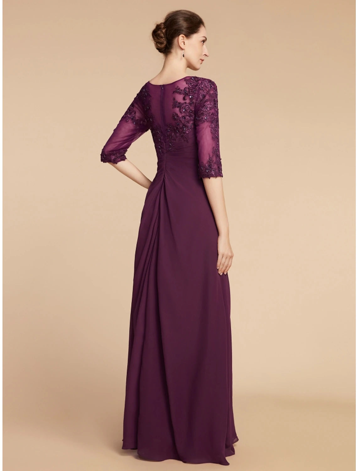 Detailed view of the shimmering sequins and intricate lace embellishments.