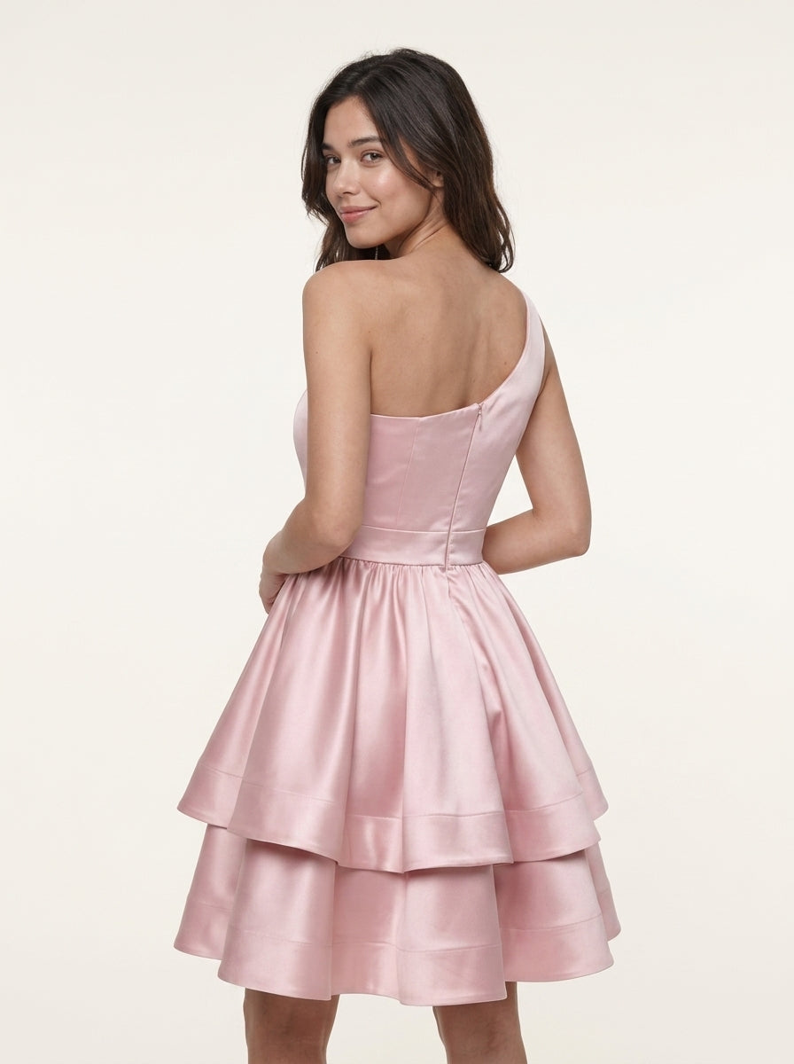 Elegant Shimmering A-Line One-Shoulder Tiered Short Homecoming Dress on a model.