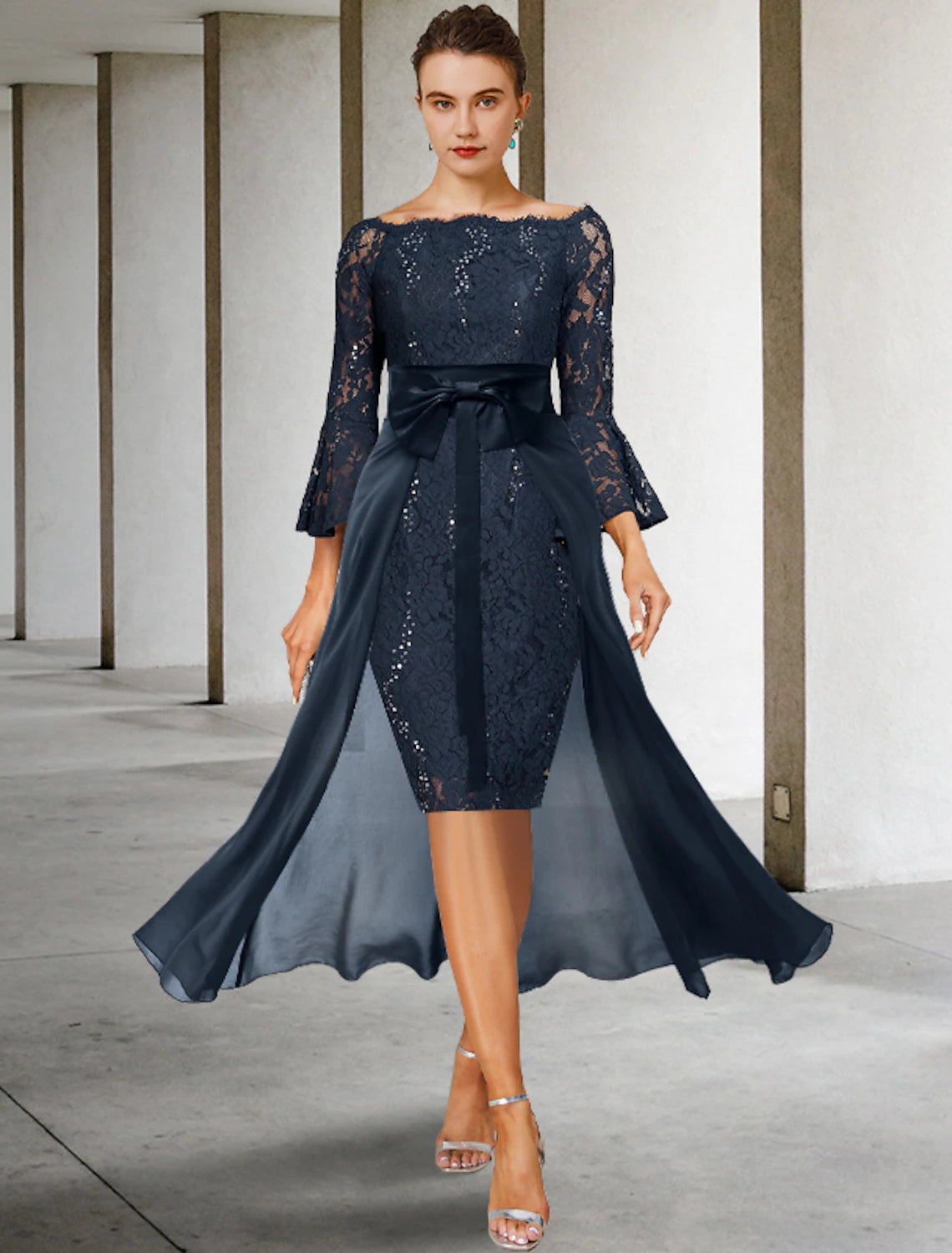 Elegant two-piece sheath dress with off-shoulder neckline and 3/4 sleeves.
